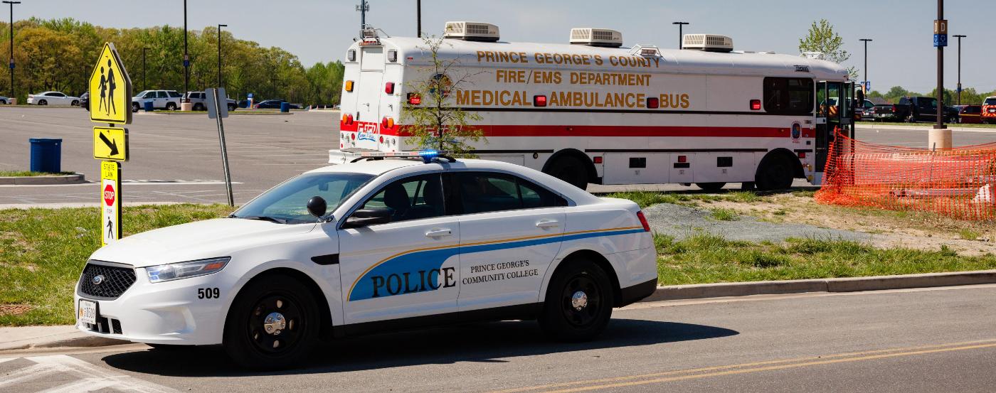 pgcc-police-cruiser-and-medical-ambulance-bus-1400×553